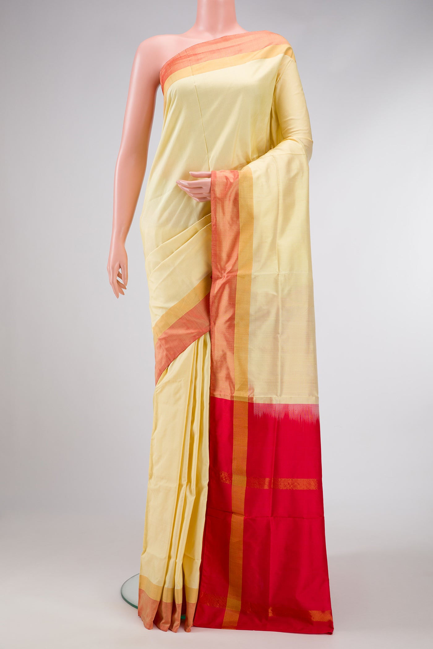 Sandal Dual Tone Uppada Silk Saree with Plain Body and Zari Border.  displayed on a mannequin