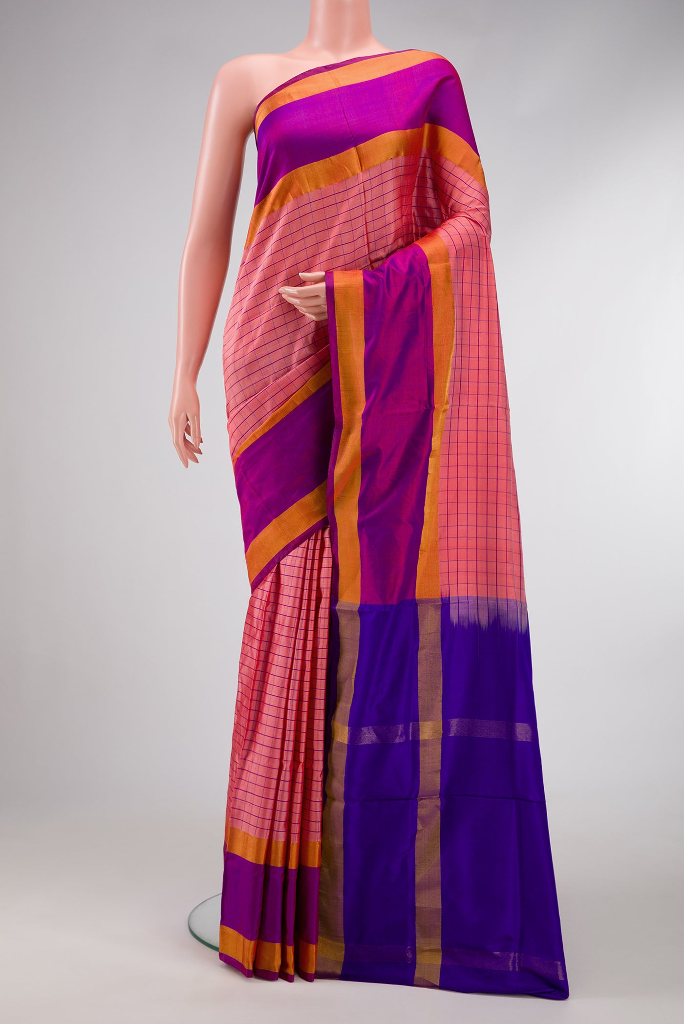 Pink Dual Tone Soft Silk Saree with Checked design on the body and Zari Border.  displayed on a mannequin