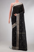 Black Dual Tone Uppada Silk Saree with Zari Butta on the body and Zari Border.  displayed on a mannequin