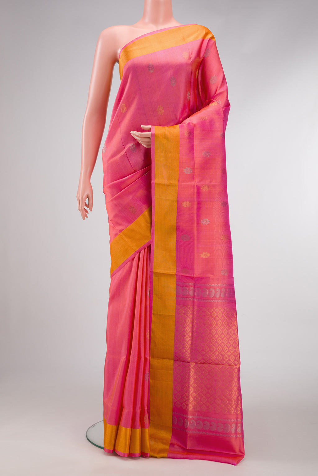 Pink Dual Tone Uppada Silk Saree with Zari Butta on the body and Zari Border.  displayed on a mannequin