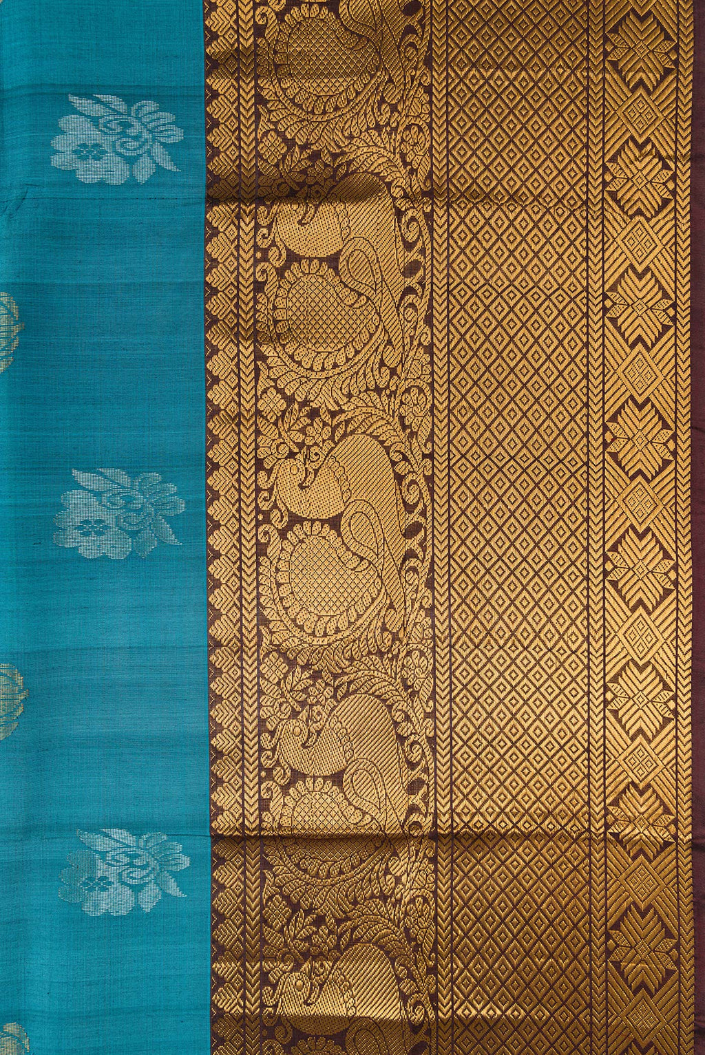 Border image of Peacock Blue Dual Tone Uppada Silk Saree with Zari Butta on the body and Zari Border. 