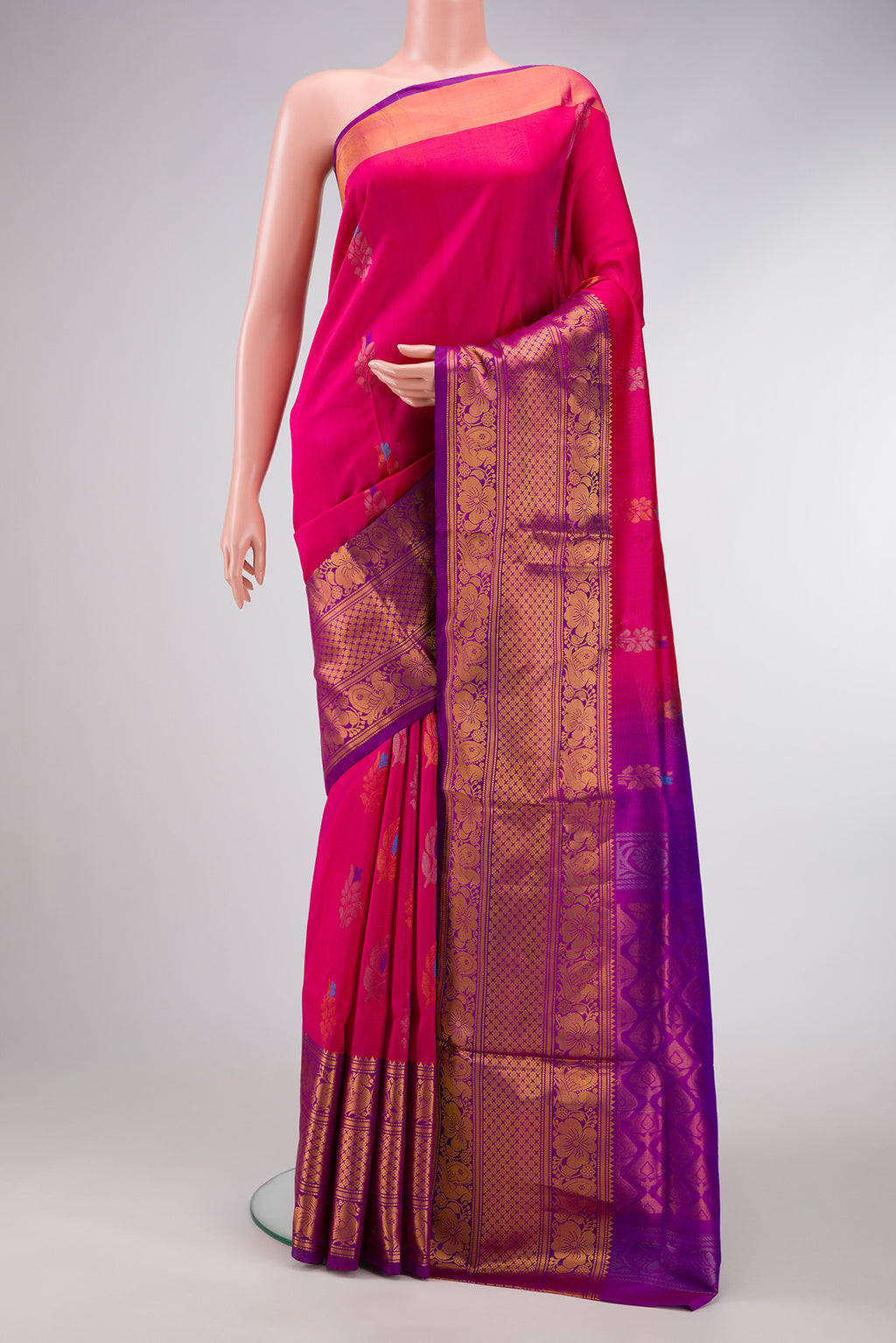 Pink Dual Tone Uppada Silk Saree with Zari And Thread Butta on the body and Zari Border.  displayed on a mannequin