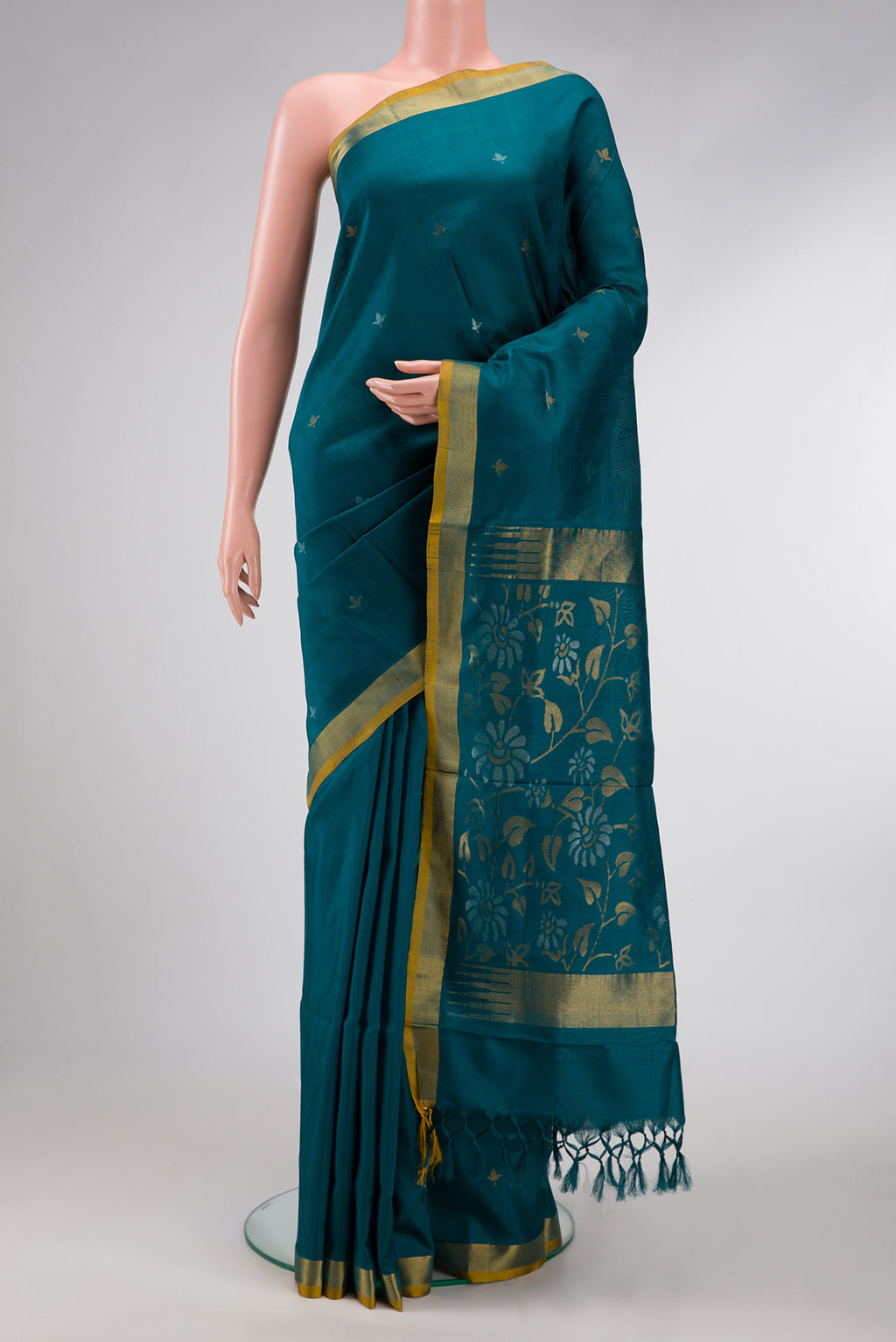 Maya Blue Dual Tone Uppada Silk Saree with Zari Butta on the body and Zari Border.  displayed on a mannequin