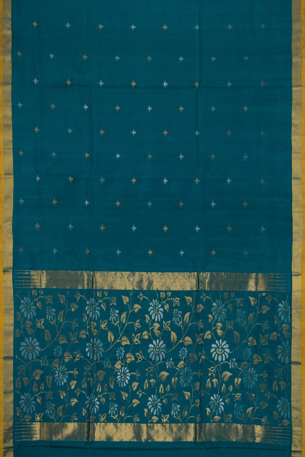 Flat view of Maya Blue Dual Tone Uppada Silk Saree with Zari Butta on the body and Zari Border. 