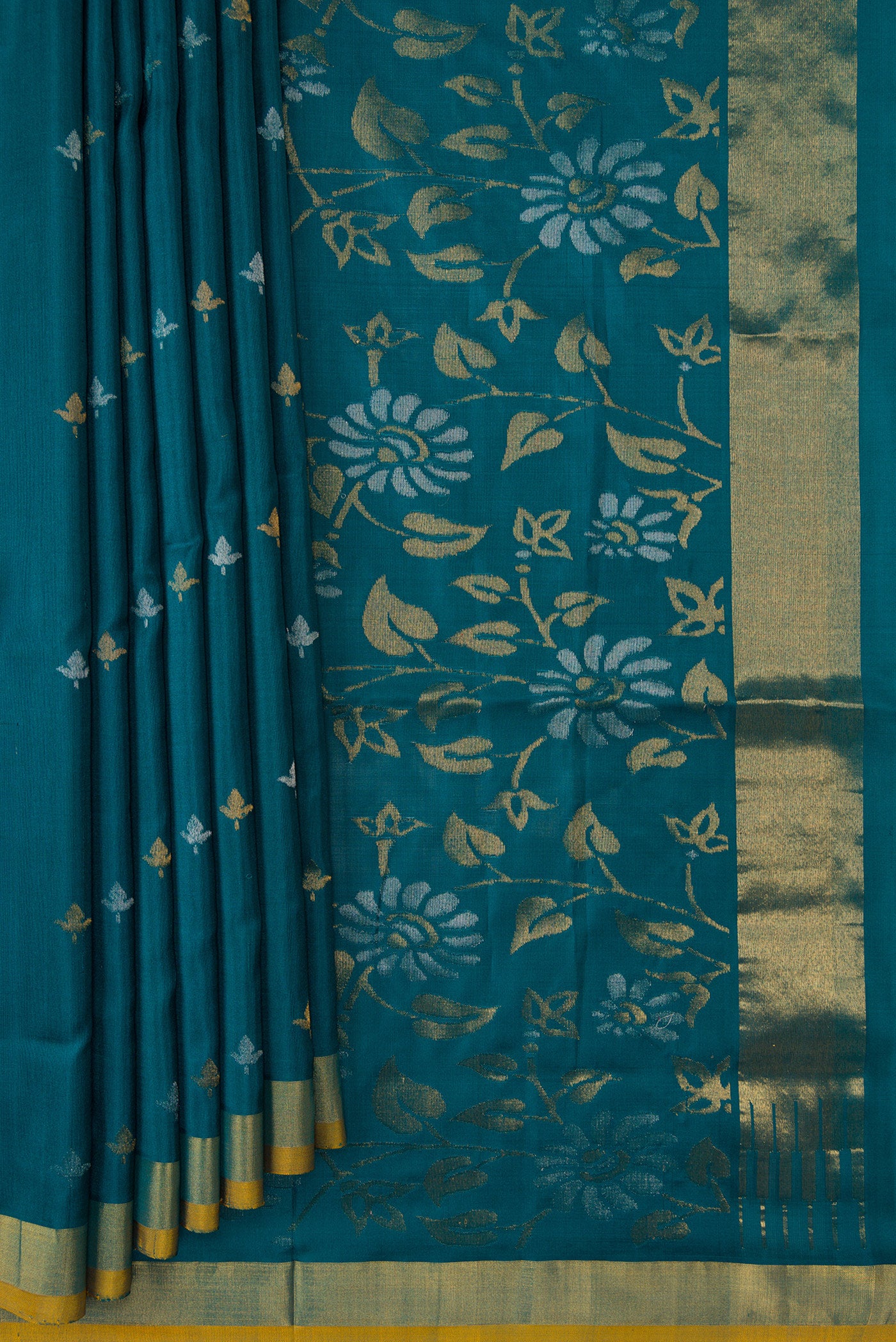 Pleats and pallu of Maya Blue Dual Tone Uppada Silk Saree with Zari Butta on the body and Zari Border. 