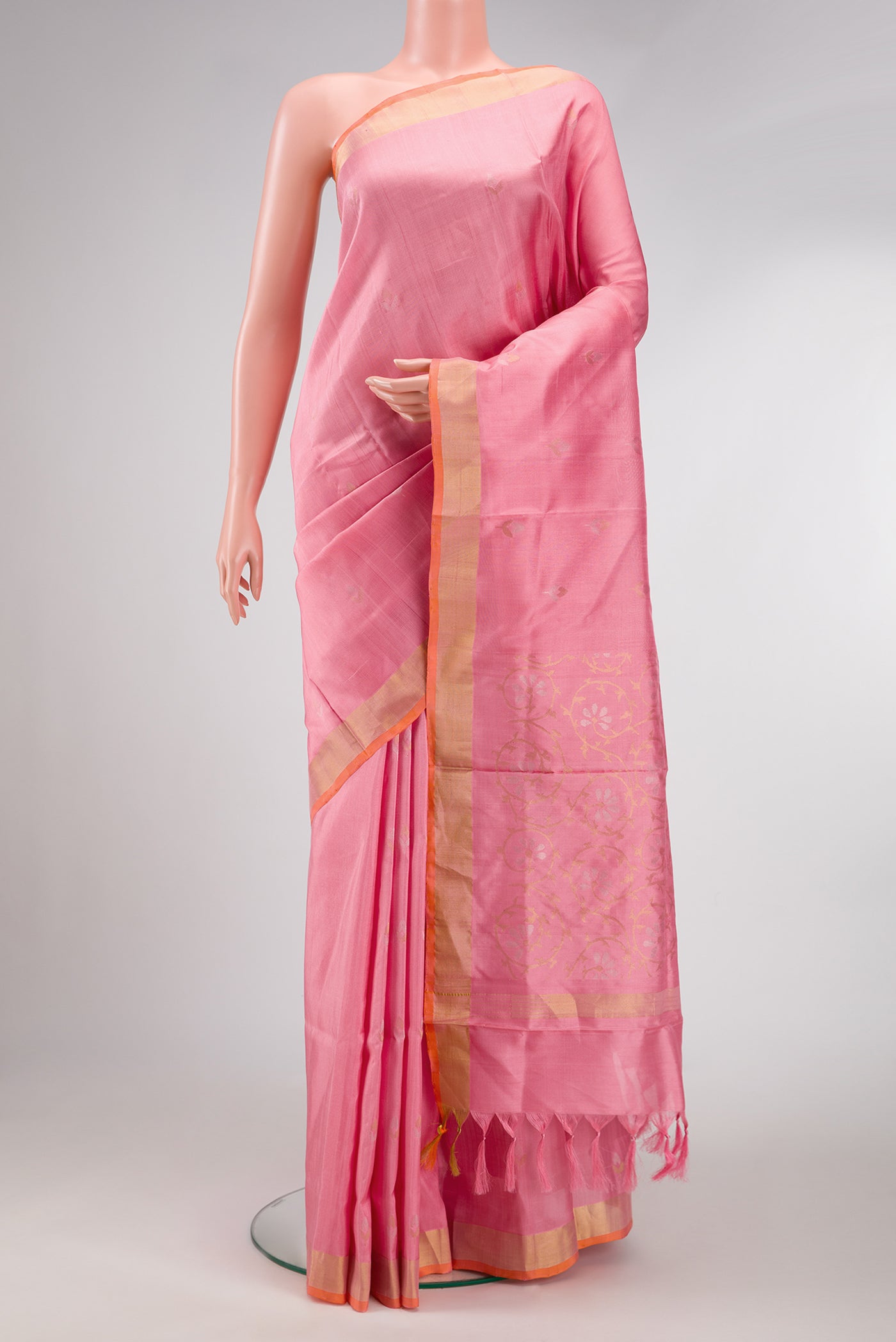 Pink Dual Tone Uppada Silk Saree with Zari And Thread Butta on the body and Zari Border.  displayed on a mannequin