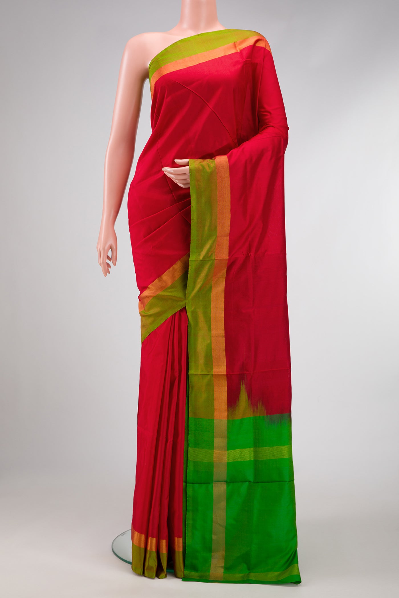 Red Dual Tone Uppada Silk Saree with Plain Body and Zari Border.  displayed on a mannequin