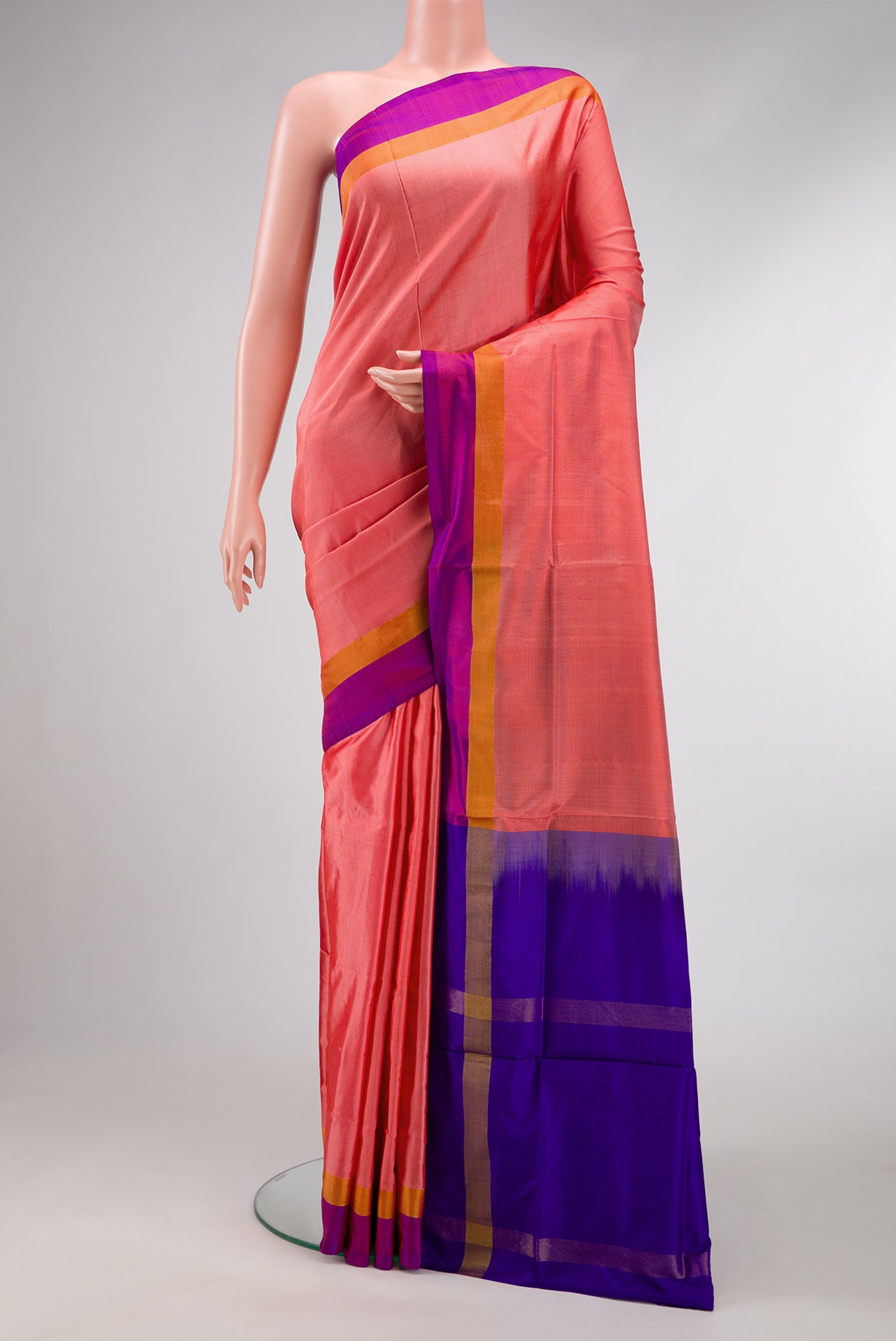 Peach Dual Tone Uppada Silk Saree with Plain Body and Zari Border.  displayed on a mannequin
