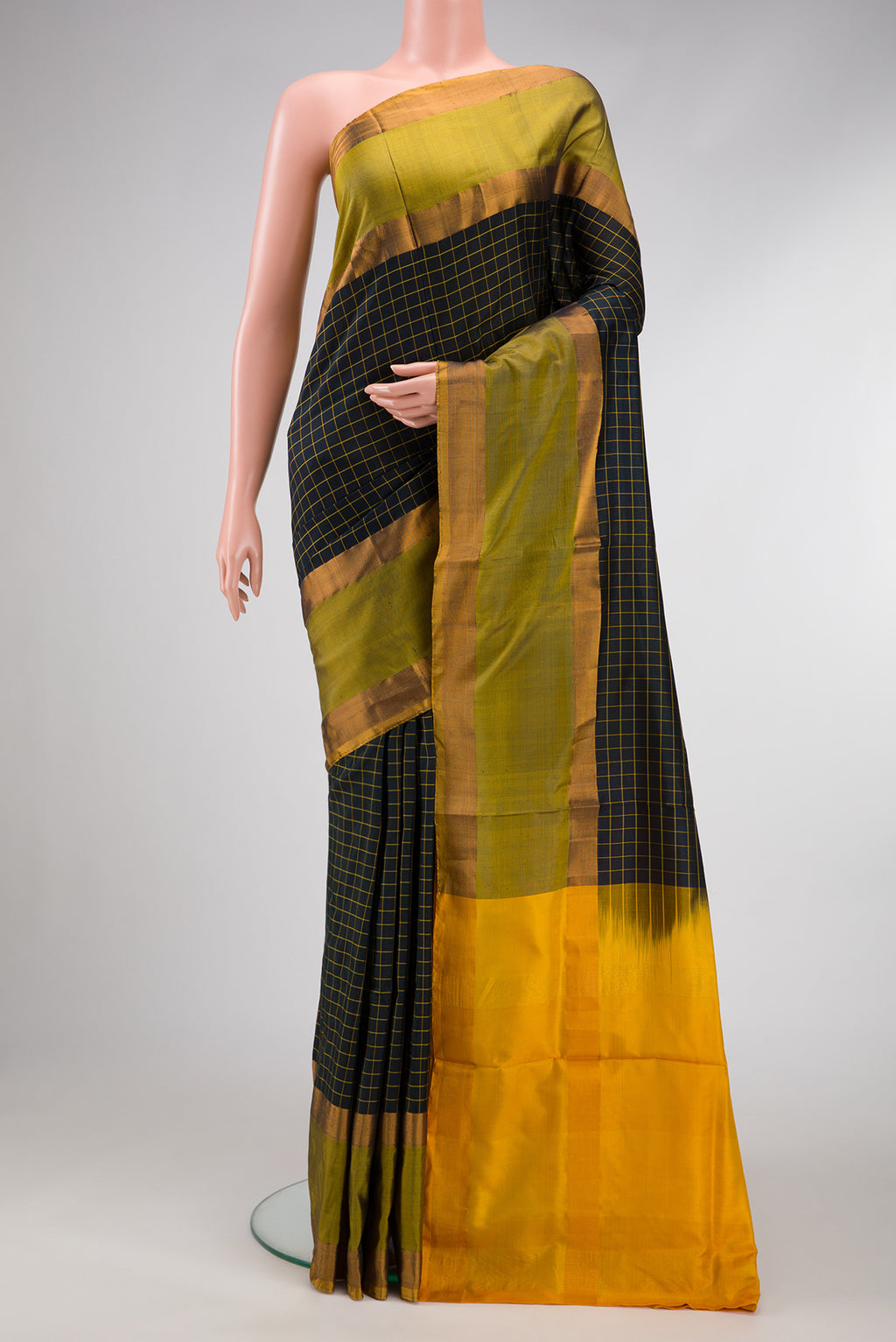 Black Dual Tone Uppada Silk Saree with Checked design on the body and Zari Border.  displayed on a mannequin