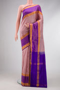 Rose Gold Dual Tone Uppada Silk Saree with Checked design on the body and Zari Border.  displayed on a mannequin