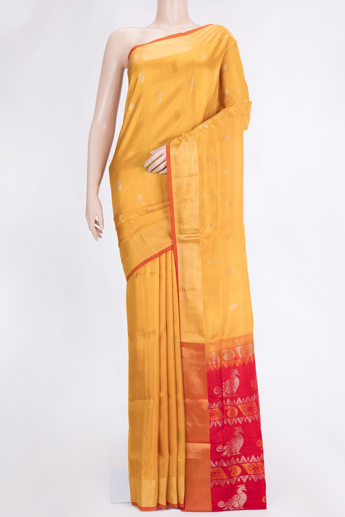 Mustard Dual Tone Uppada Silk Saree with Zari Butta on the body and Zari Border.  displayed on a mannequin