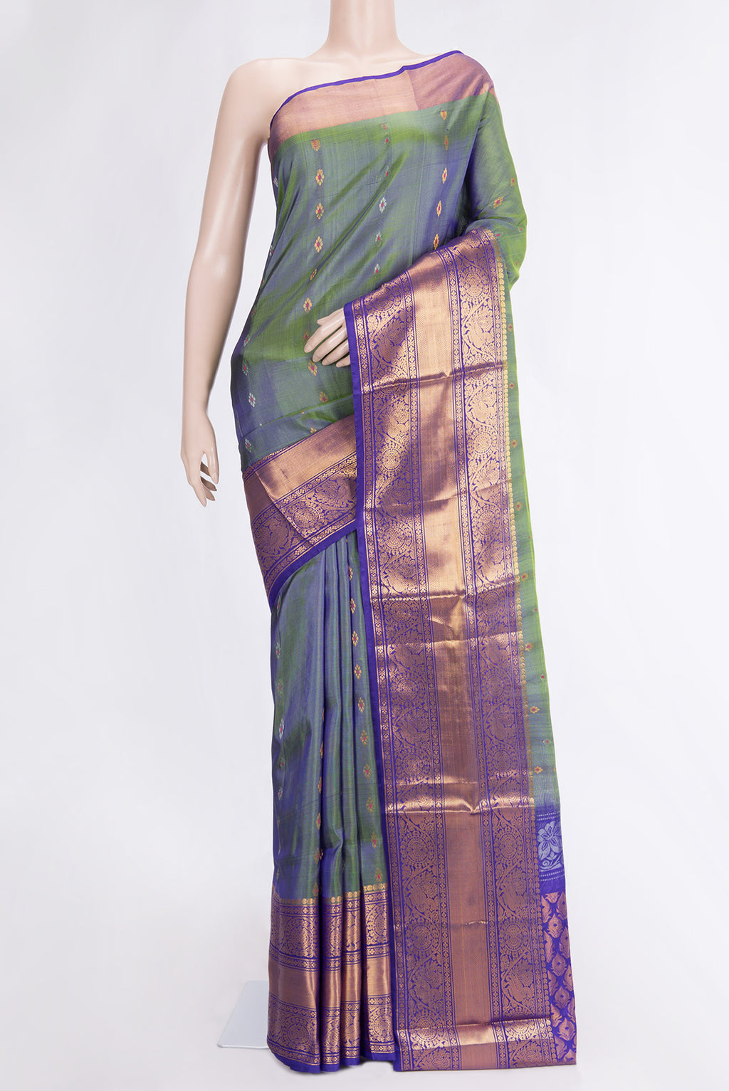 Green Dual Tone Uppada Silk Saree with Zari And Thread Butta on the body and Zari Border.  displayed on a mannequin