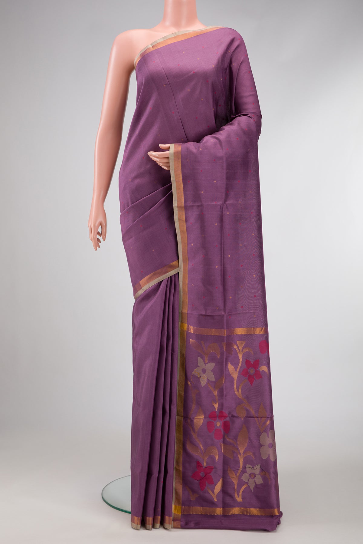 Lavender Dual Tone Uppada Silk Saree with Zari And Thread Butta on the body and Zari Border.  displayed on a mannequin