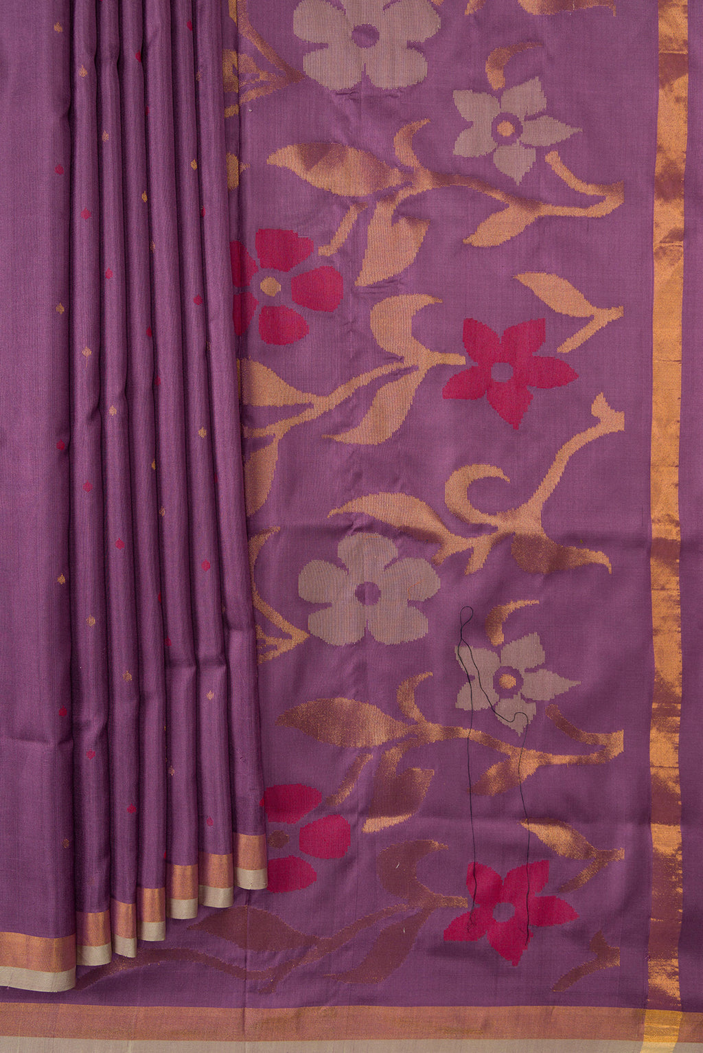Pleats and pallu of Lavender Dual Tone Uppada Silk Saree with Zari And Thread Butta on the body and Zari Border. 