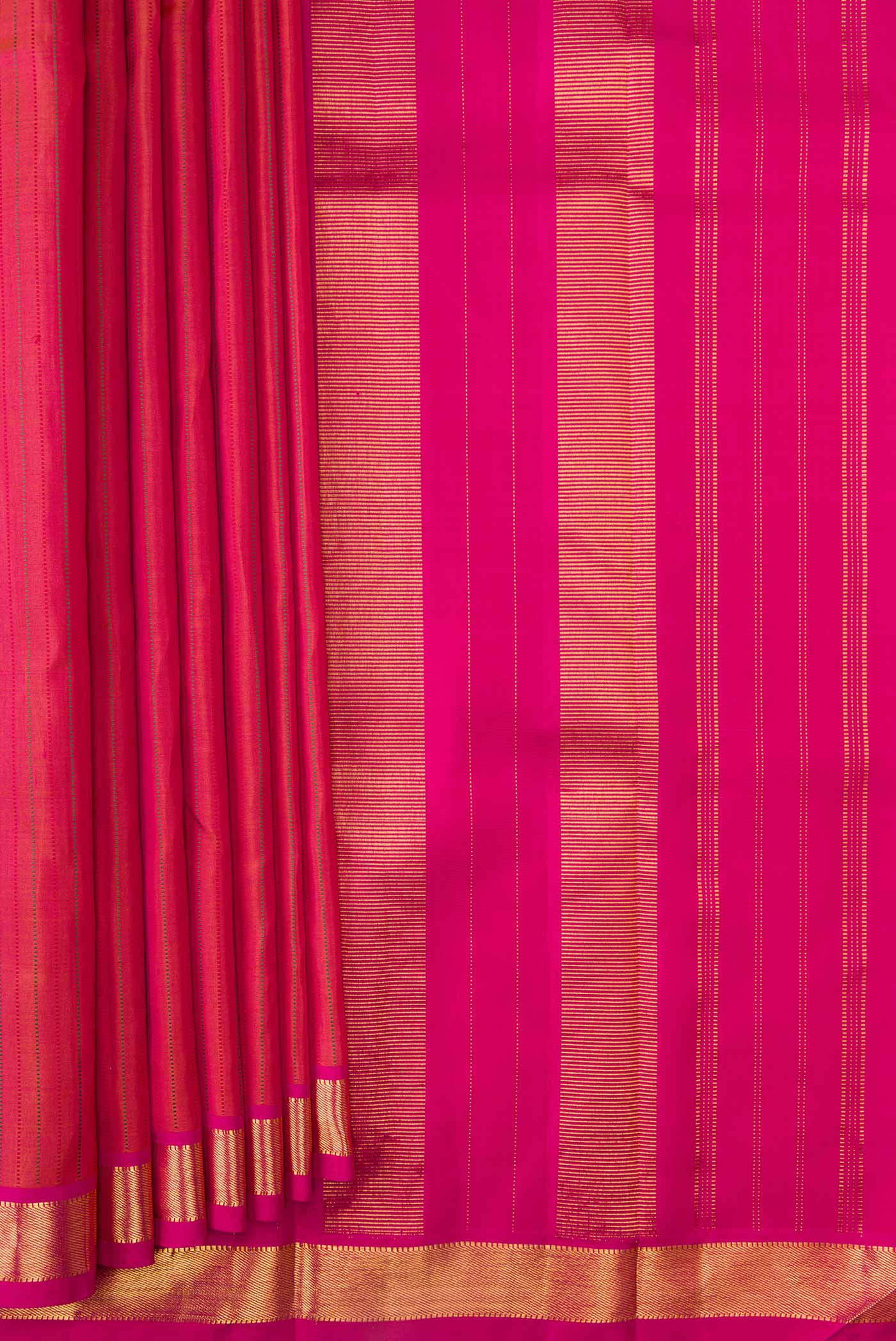 Pleats and pallu of Dark Mauve Dual Tone Kanchipuram Silk Saree with Stripes on the body and Zari Border. 