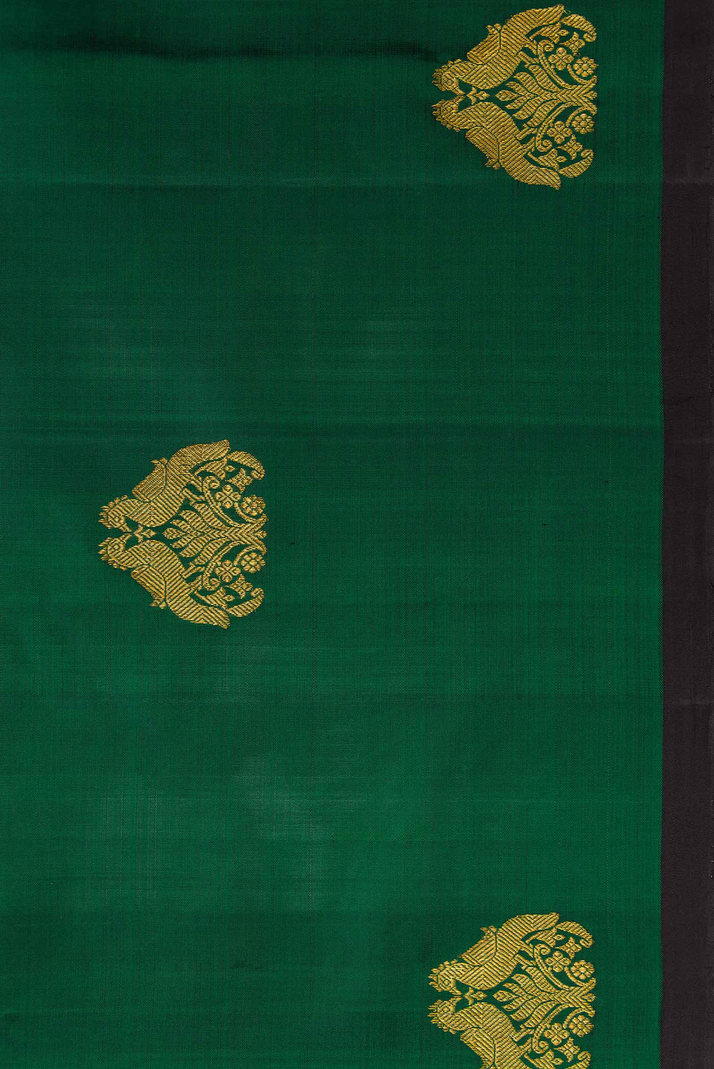 Border image of Bottle Green Dual Tone Kanchipuram Silk Saree with Zari Butta on the body and Plain Border. 
