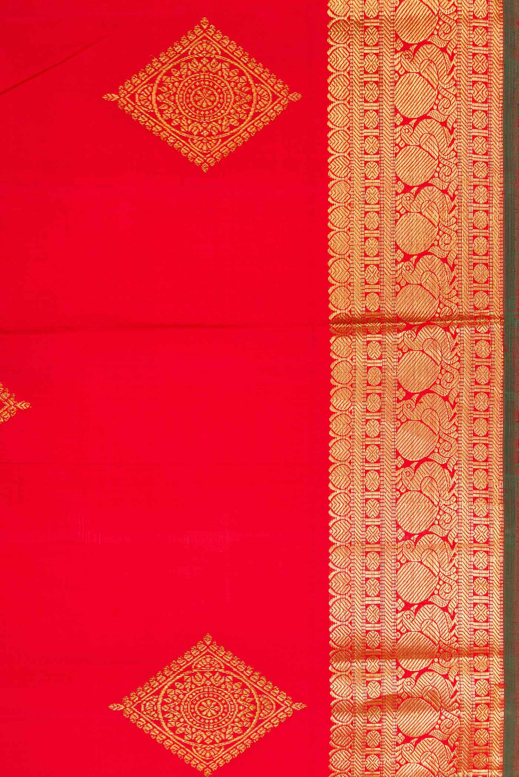 Border image of Red Dual Tone Kanjivaram Silk Saree with Zari Butta on the body and Zari Border. 