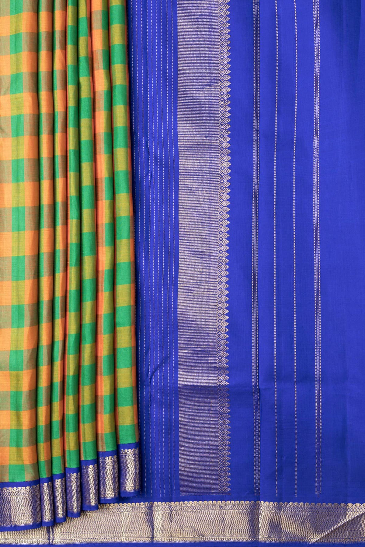 Pleats and pallu of Green and Orange Color Kanjivaram Silk Saree with Checked design on the body and Zari Border. 