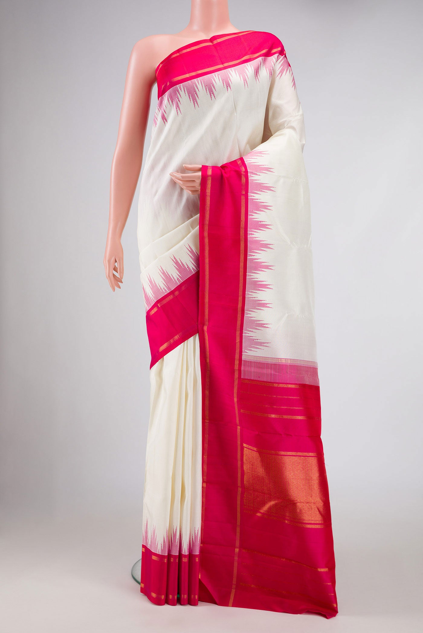 Off White Dual Tone Kanchipuram Silk Saree with Plain Body and Temple Border displayed on a mannequin