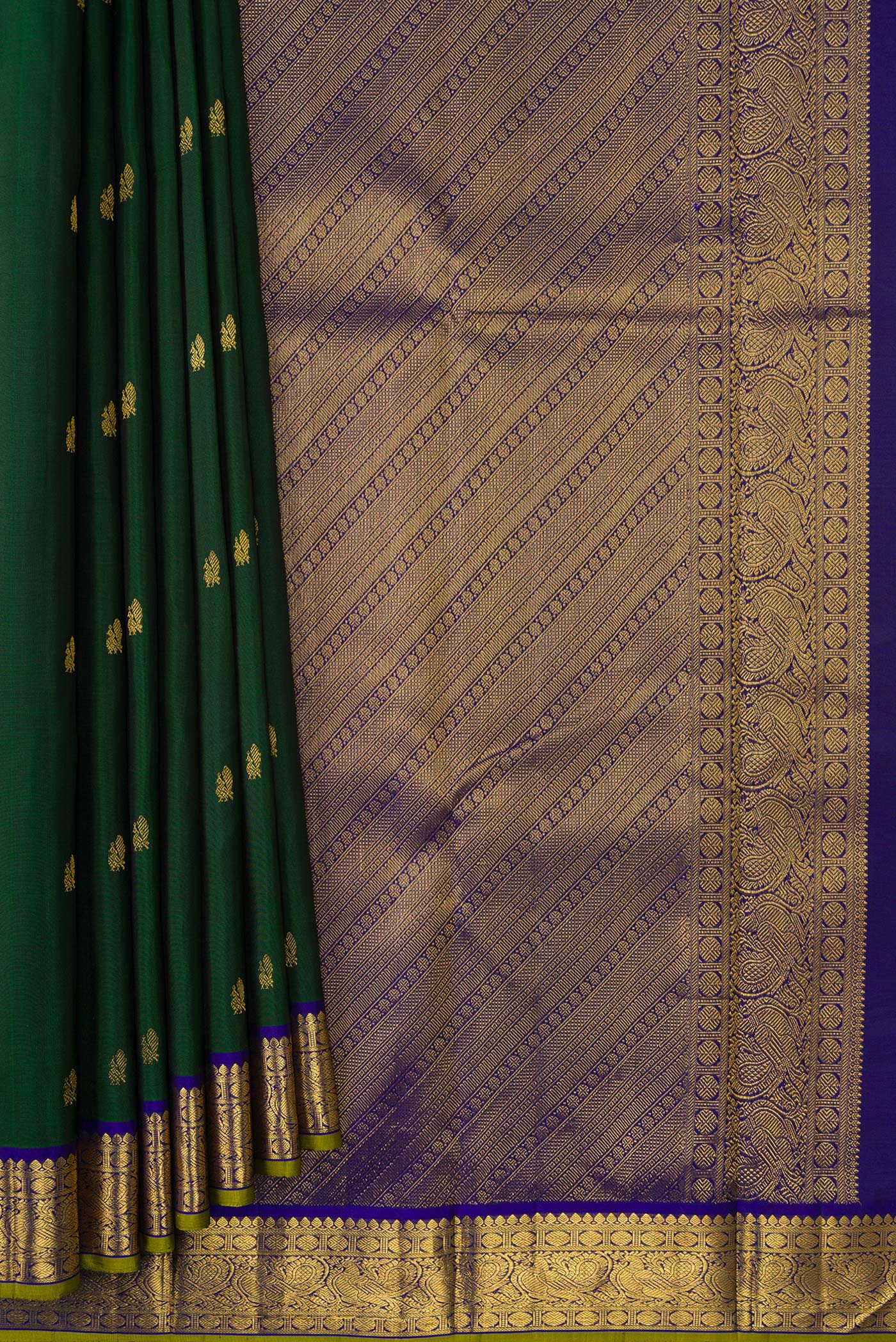 Pleats and pallu of Bottle Green Dual Tone Kanchipuram Silk Saree with Zari Butta on the body and Zari Border. 