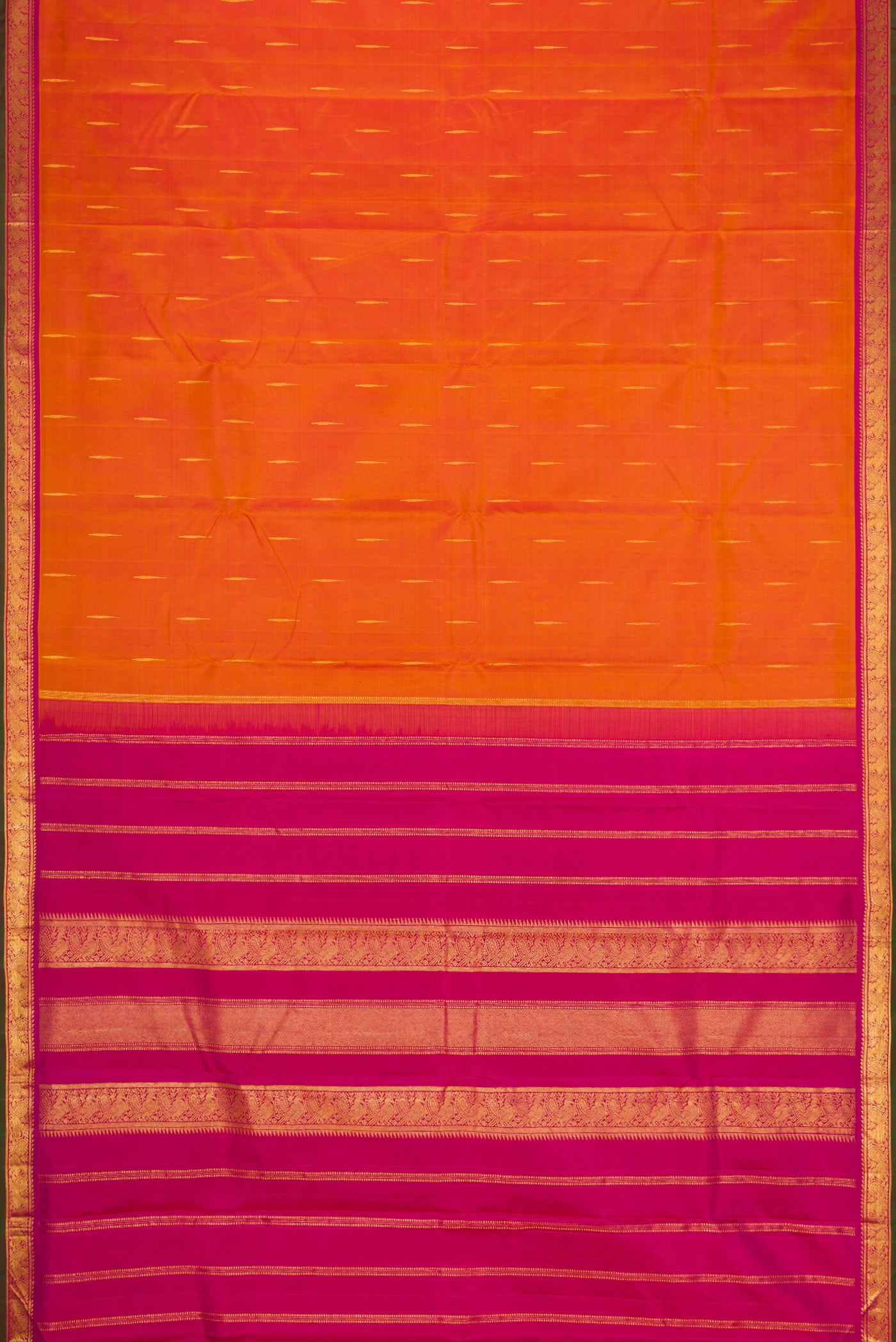 Flat view of Mustard Dual Tone Kanchipuram Silk Saree with Zari Butta on the body and Zari Border. 