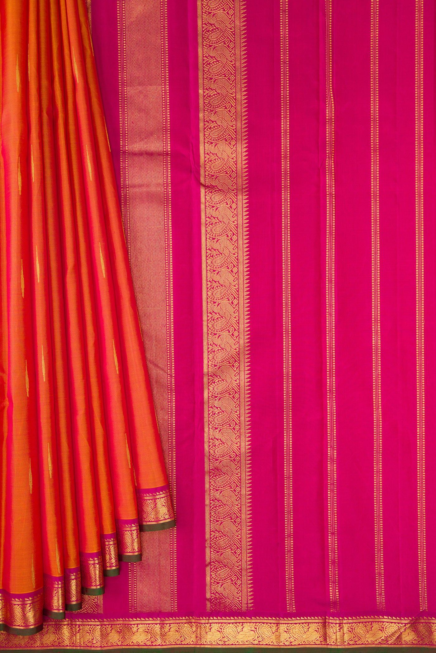Pleats and pallu of Mustard Dual Tone Kanchipuram Silk Saree with Zari Butta on the body and Zari Border. 