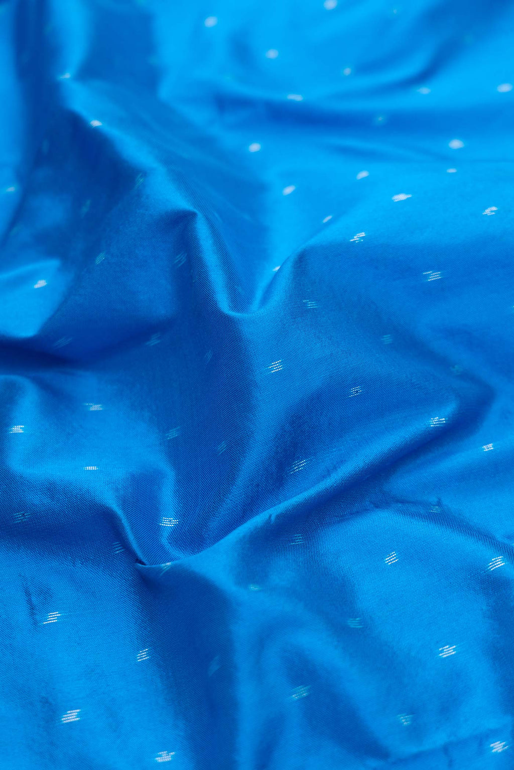 Close up of Royal Blue Pochampally Silk Saree with Pure Ikat on the body and Ikat Border displaying folds
