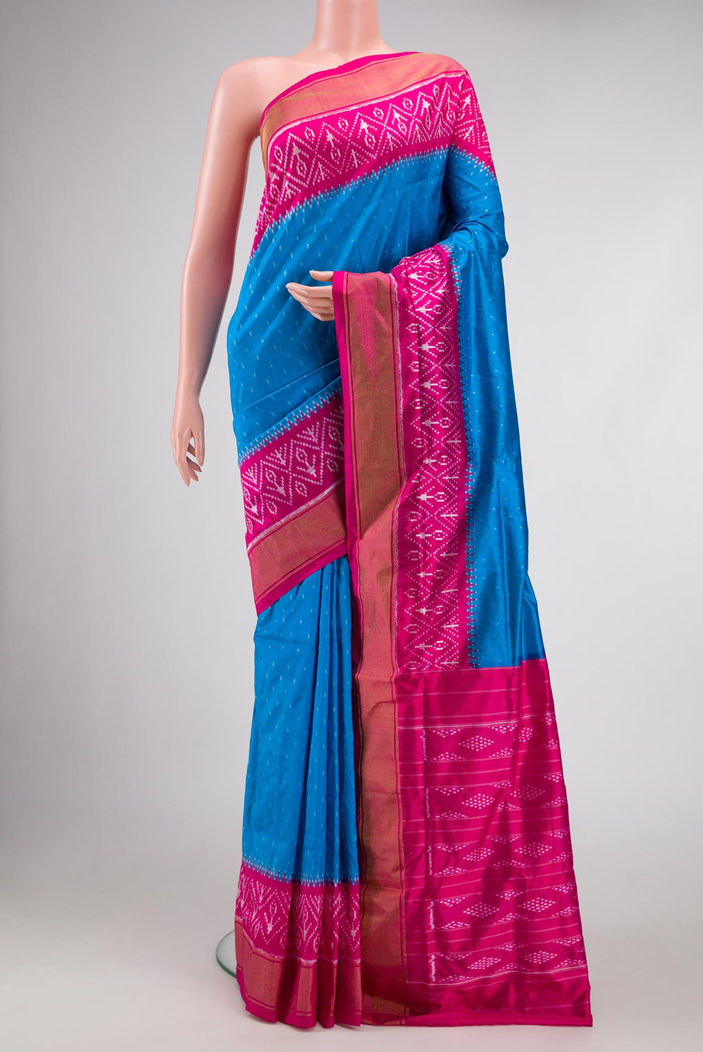 Royal Blue Pochampally Silk Saree with Pure Ikat on the body and Ikat Border displayed on a mannequin