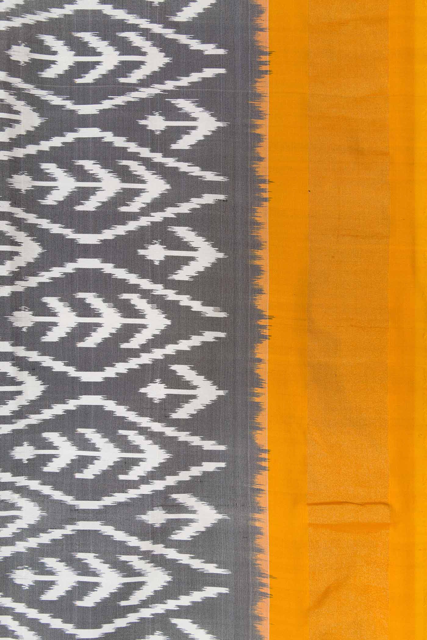 Border image of Grey Pochampally Silk Saree with Pure Ikat on the body and Zari Border