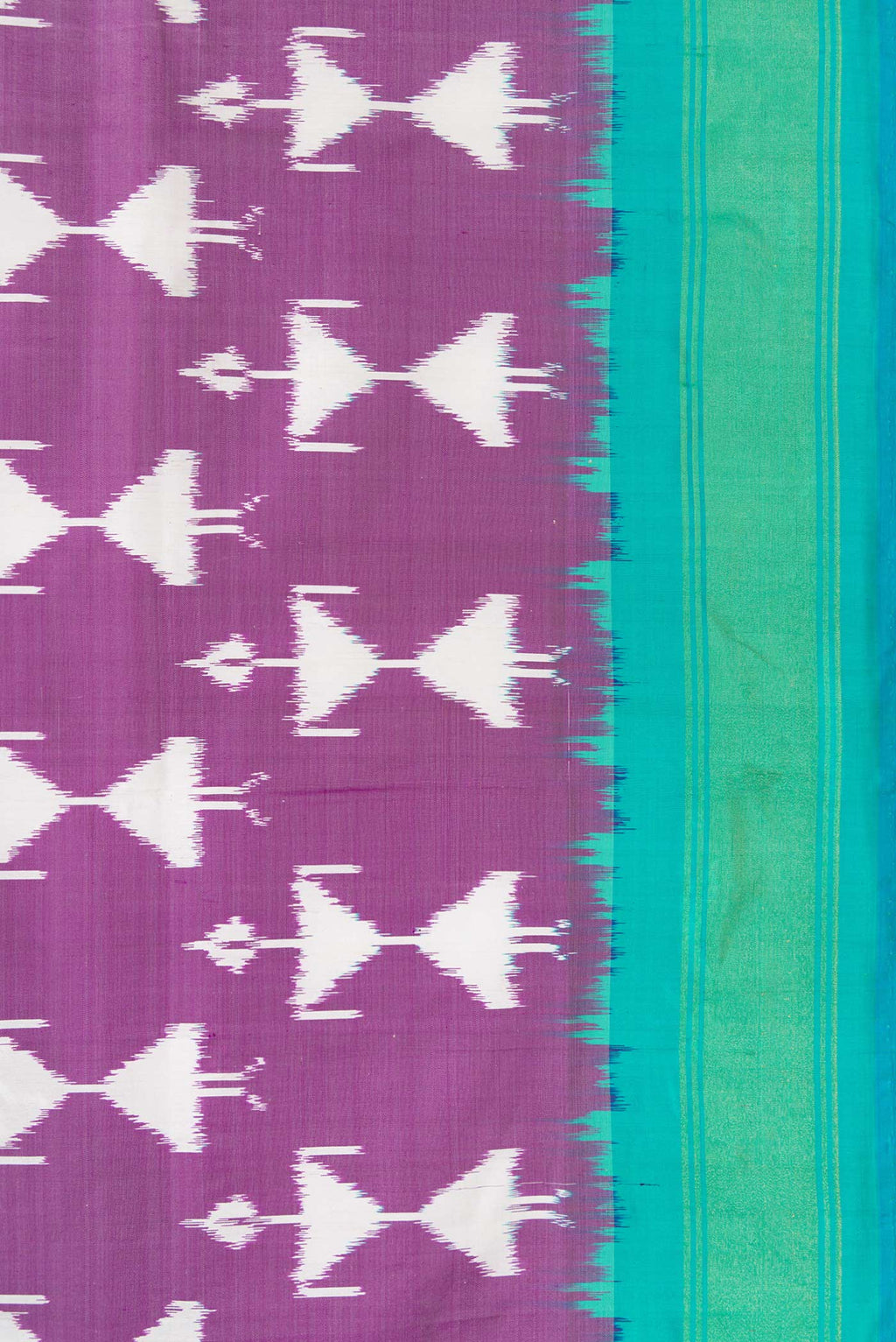 Border image of Purple Dual Tone Double Ikat Saree with Ikat Print on the body and Zari Border. 