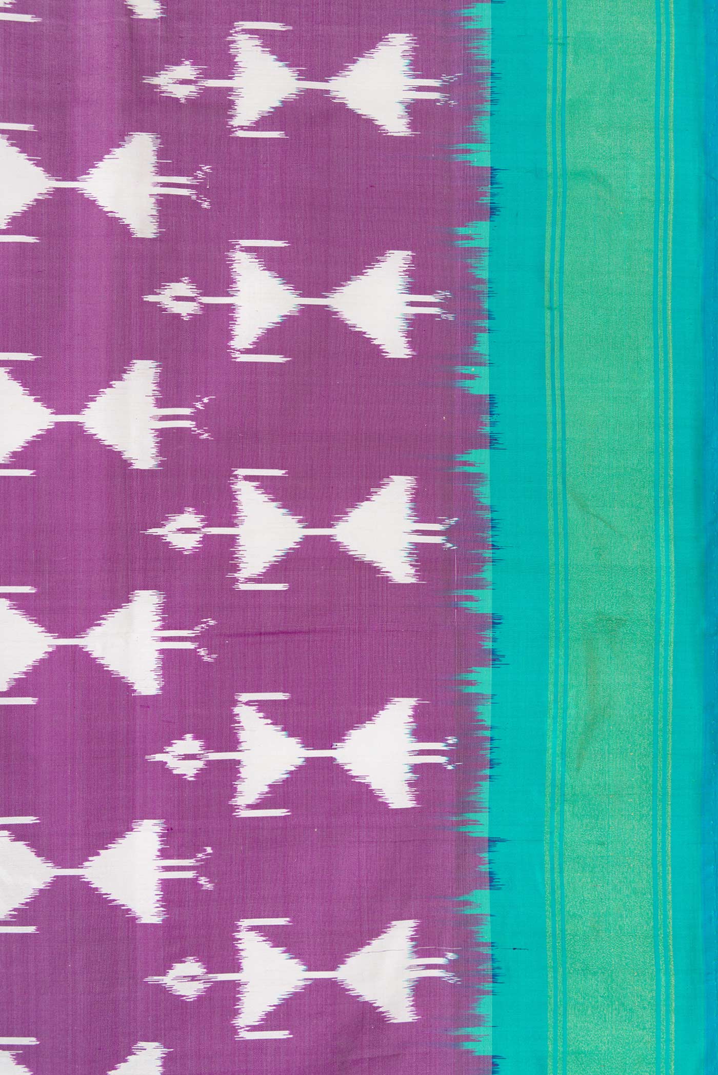 Border image of Purple Dual Tone Double Ikat Saree with Ikat Print on the body and Zari Border. 