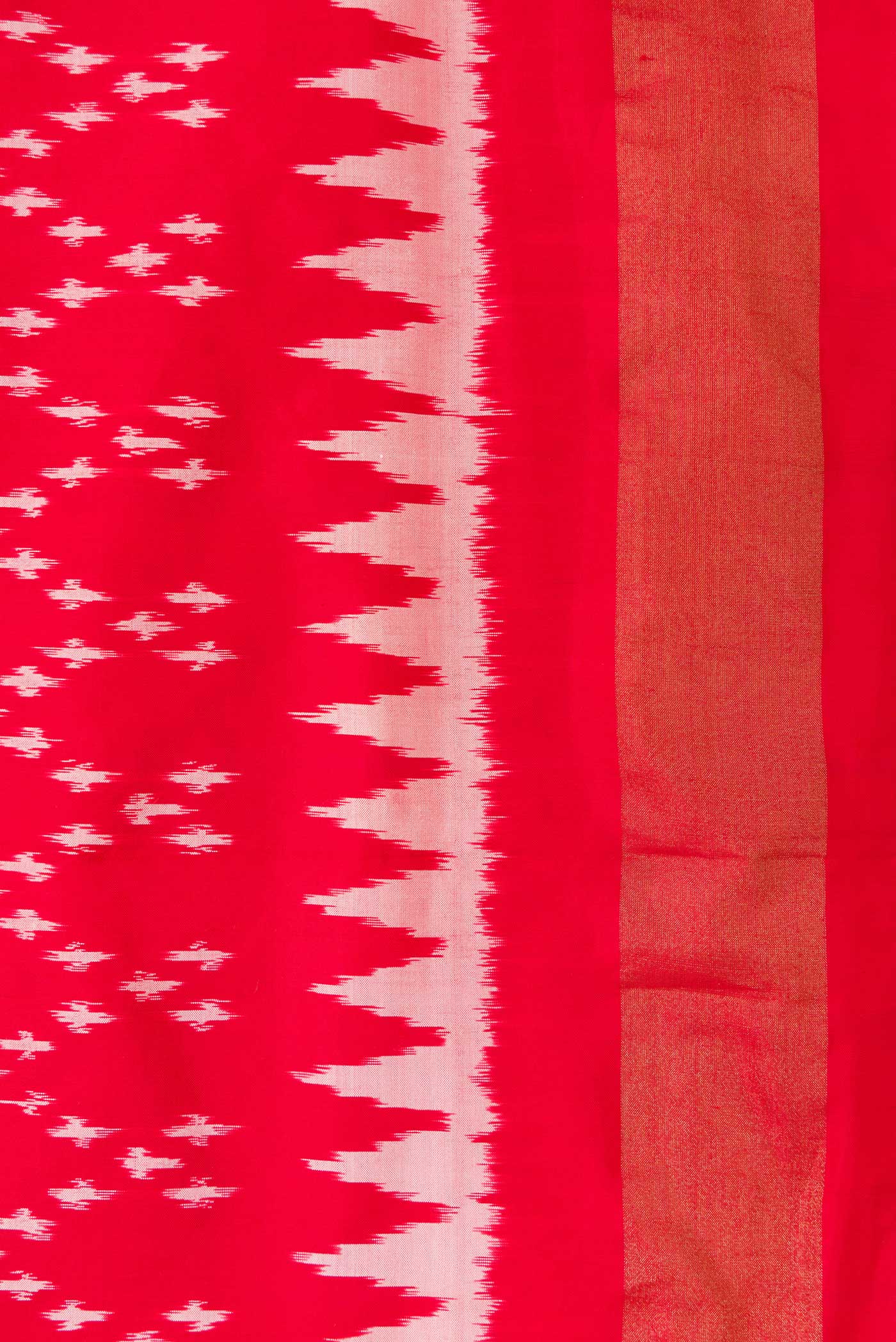 Border image of Red Dual Tone Double Ikat Saree with Ikat Print on the body and Zari Border. 