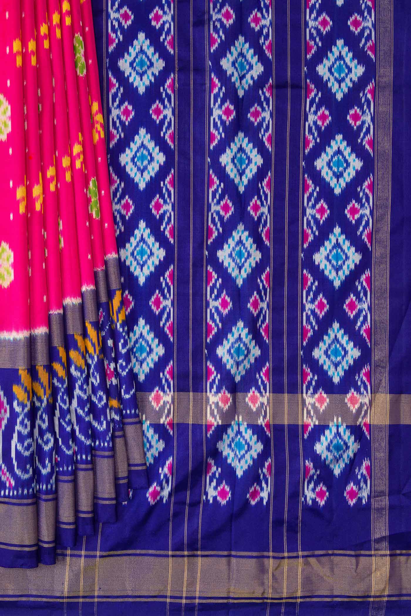 Pleats and pallu of Pink Dual Tone Double Ikat Saree with Ikat Print on the body and Ikat Border. 