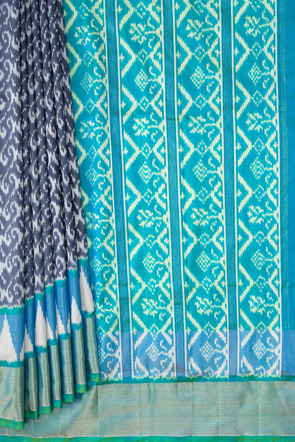 Pleats and pallu of Grey Dual Tone Double Ikat Saree with Ikat Print on the body and Ikat Border
