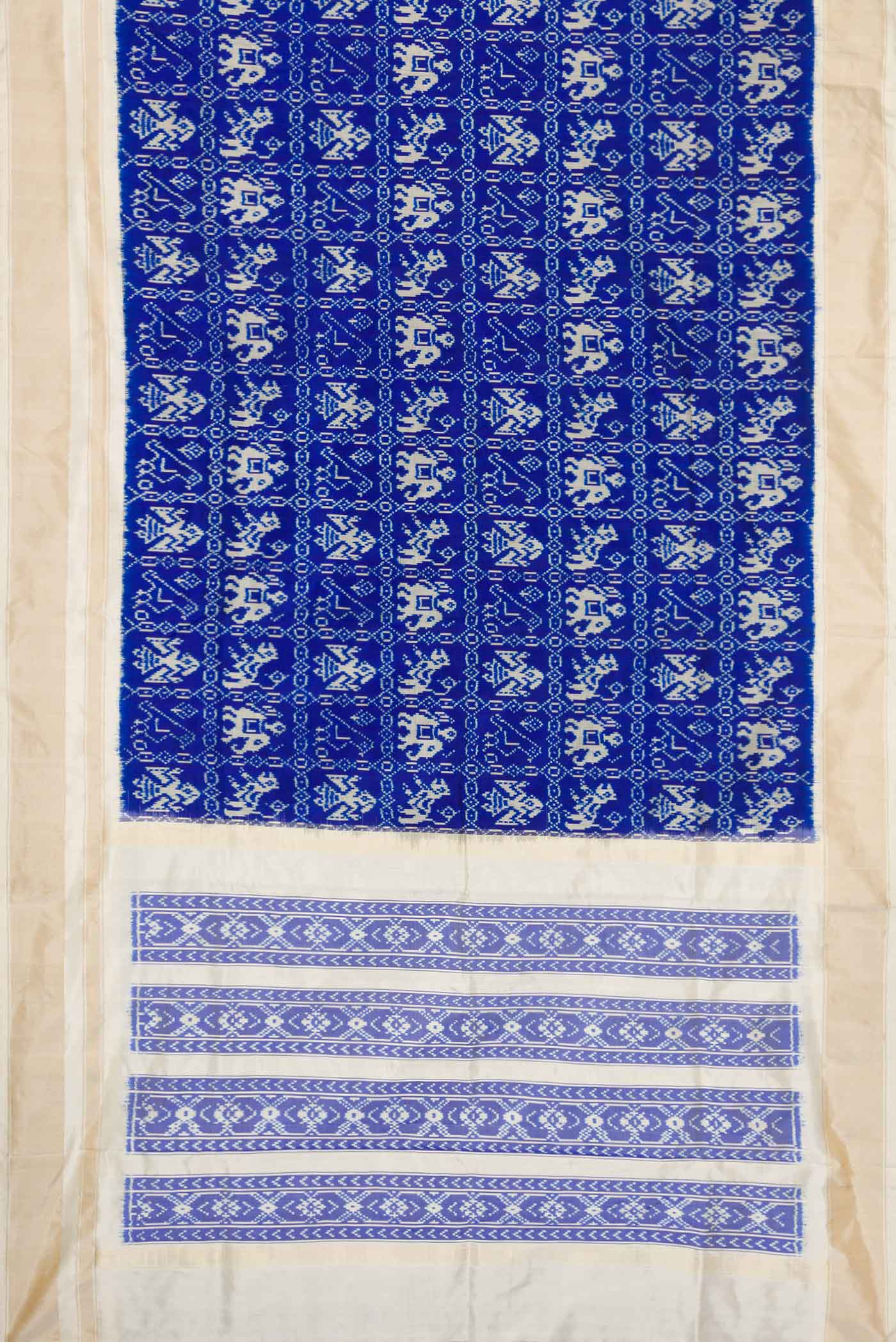 Flat view of Royal Blue Dual Tone Double Ikat Saree with Ikat Print on the body and Zari Border. 