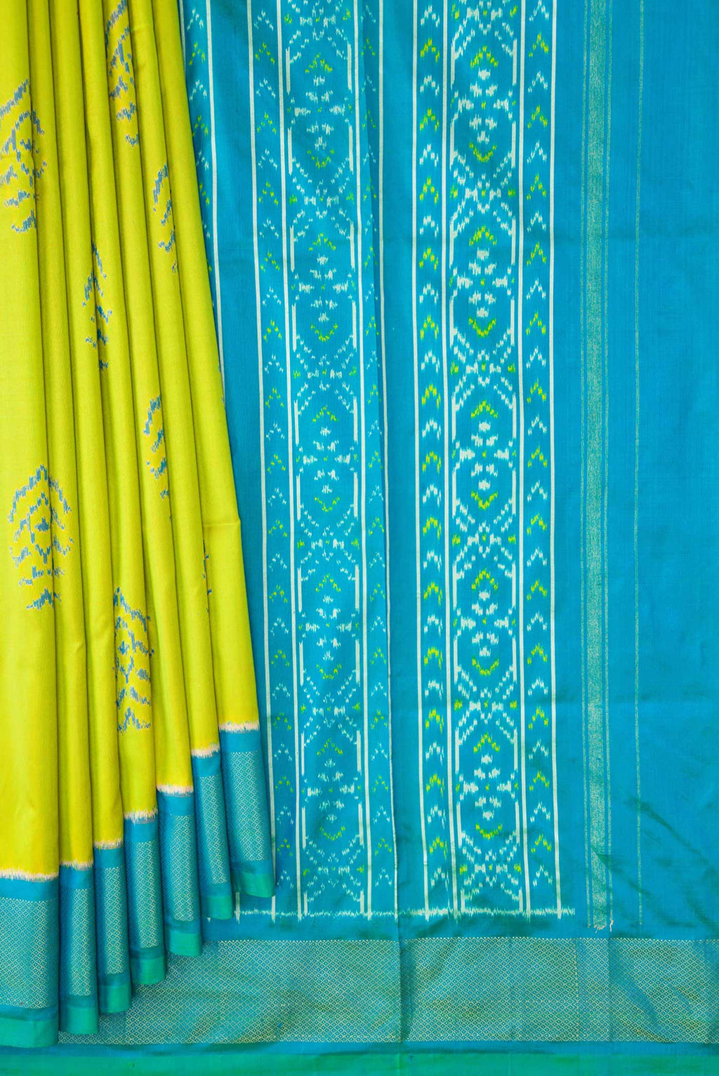 Pleats and pallu of Parrot Green Dual Tone Double Ikat Saree with Ikat Print on the body and Ikat Border