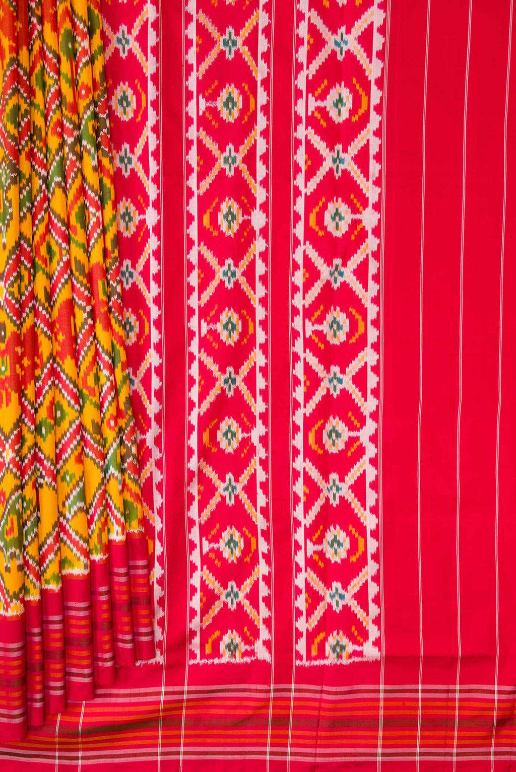 Pleats and pallu of Yellow Dual Tone Double Ikat Saree with Ikat Print on the body and Thread Border