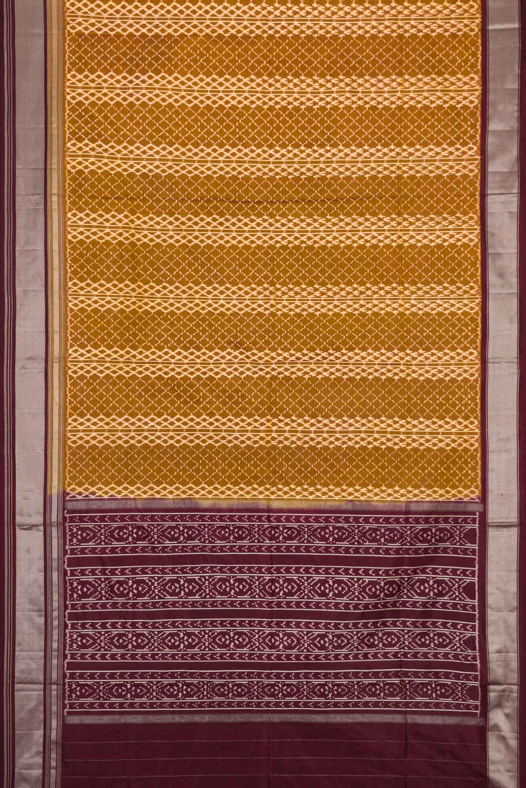 Flat view of Mehandi Green Dual Tone Double Ikat Saree with Ikat Print on the body and Zari Border. 