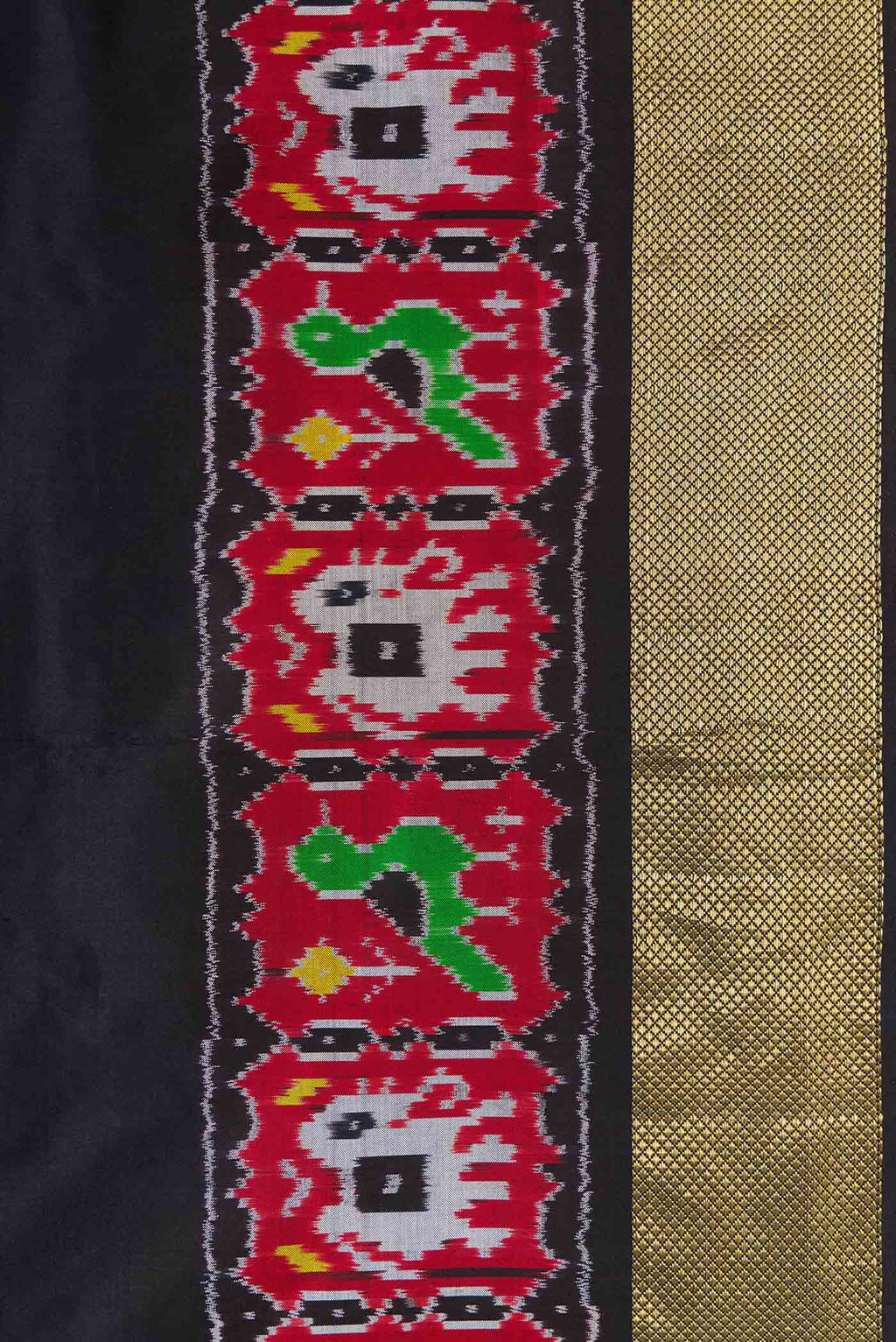 Border image of Black Dual Tone Double Ikat Saree with Plain Body and Ikat Border. 