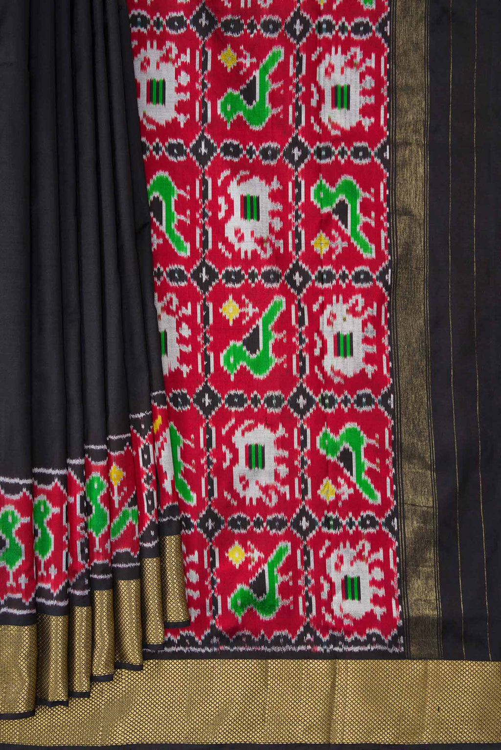 Pleats and pallu of Black Dual Tone Double Ikat Saree with Plain Body and Ikat Border. 