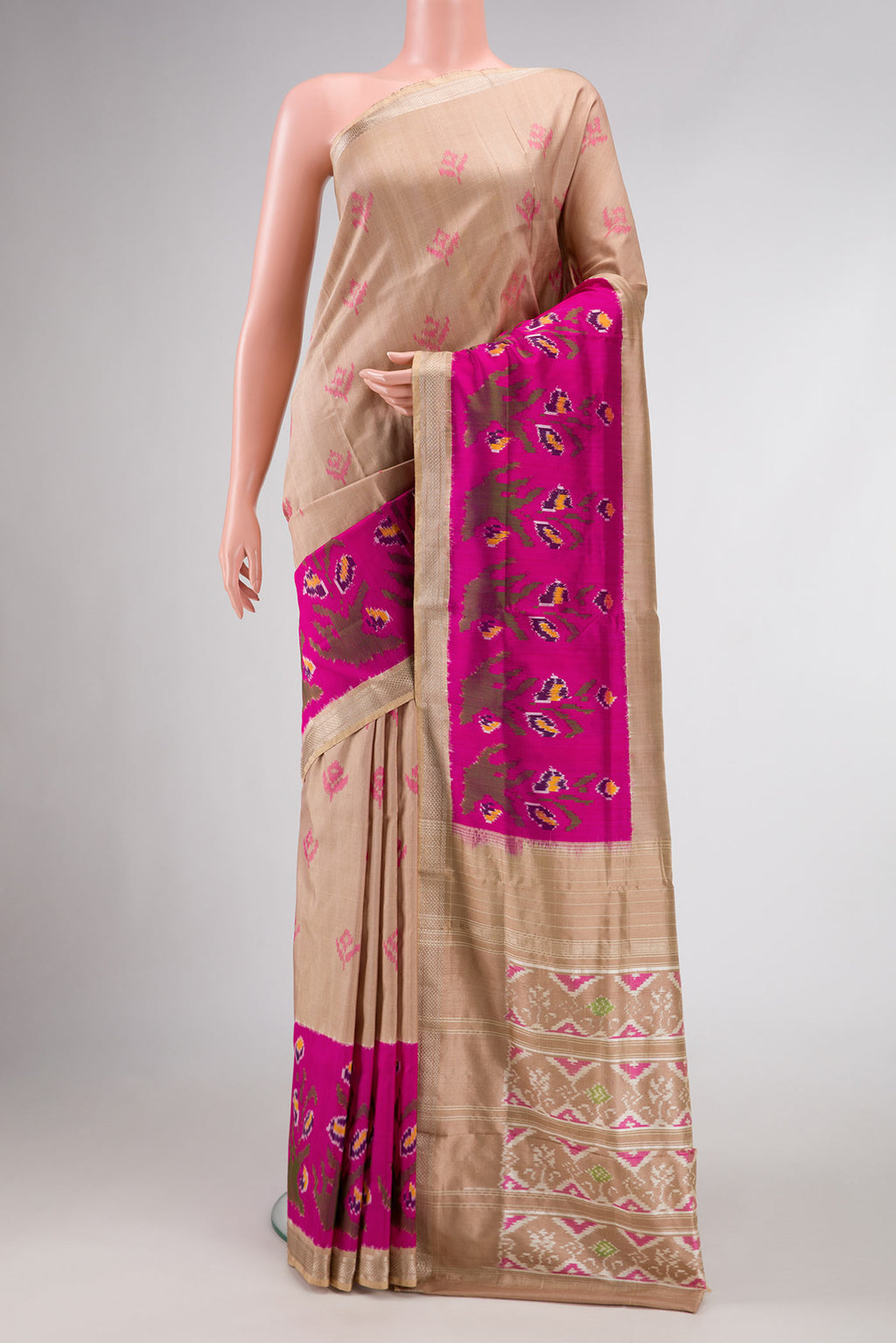 Beige Dual Tone Double Ikat Saree with Ikat Print on the body and Ikat Border.  displayed on a mannequin