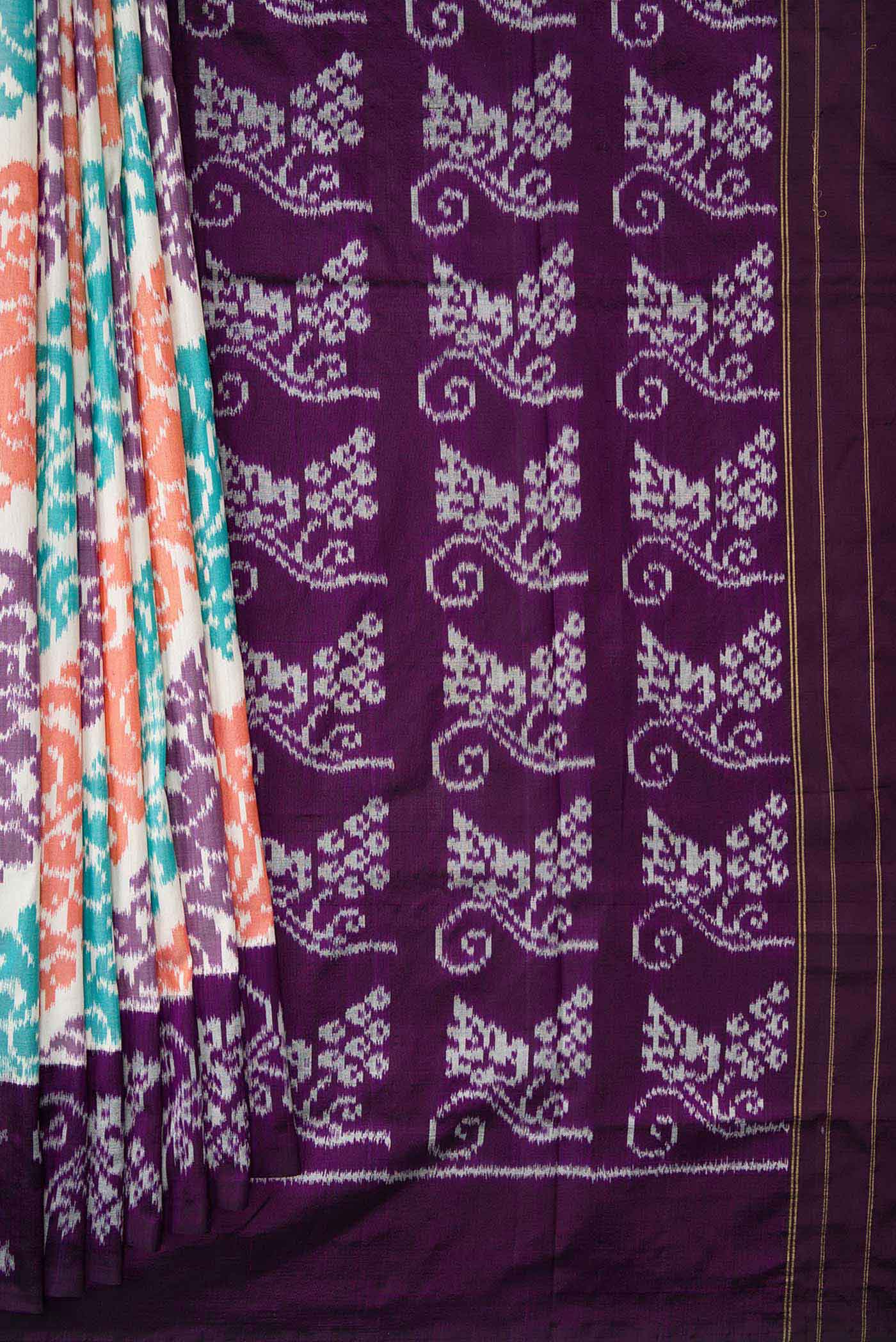 Pleats and pallu of Off White Dual Tone Double Ikat Saree with Ikat Print on the body and Plain Border. 