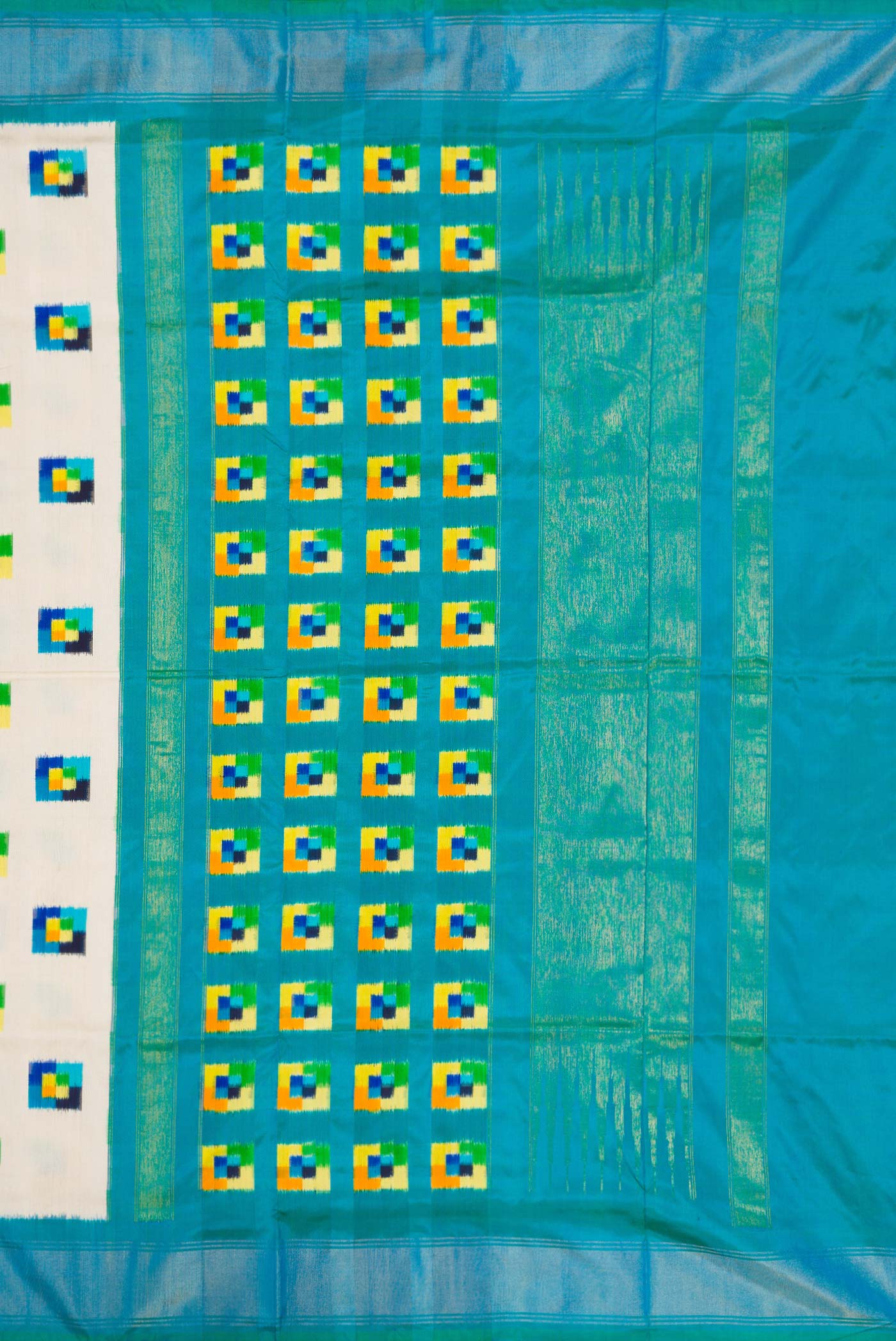 Close up image of the pallu of Off White Pochampally Silk Saree with Pure Ikat on the body and Zari Border