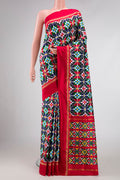 Multi Color Pochampally Silk Saree with Pure Ikat on the body and Zari Border displayed on a mannequin