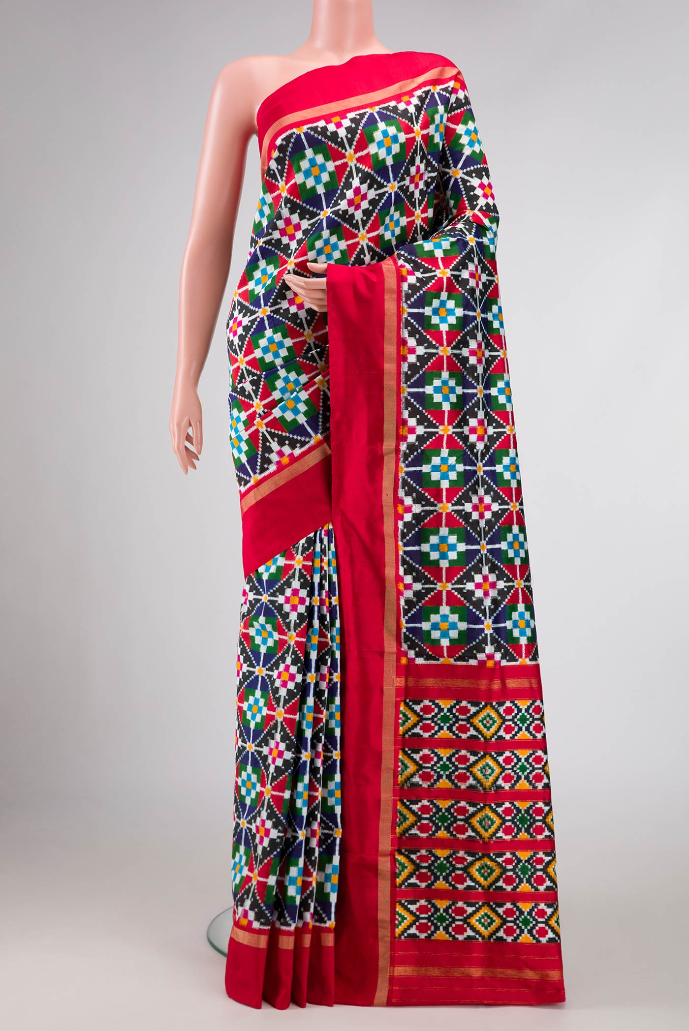 Multi Color Pochampally Silk Saree with Pure Ikat on the body and Zari Border displayed on a mannequin