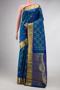 Pure Silk Pure Zari Peacock Blue Dual Tone Kanjivaram Saree with Checked design on the body and Zari Border.  displayed on a mannequin