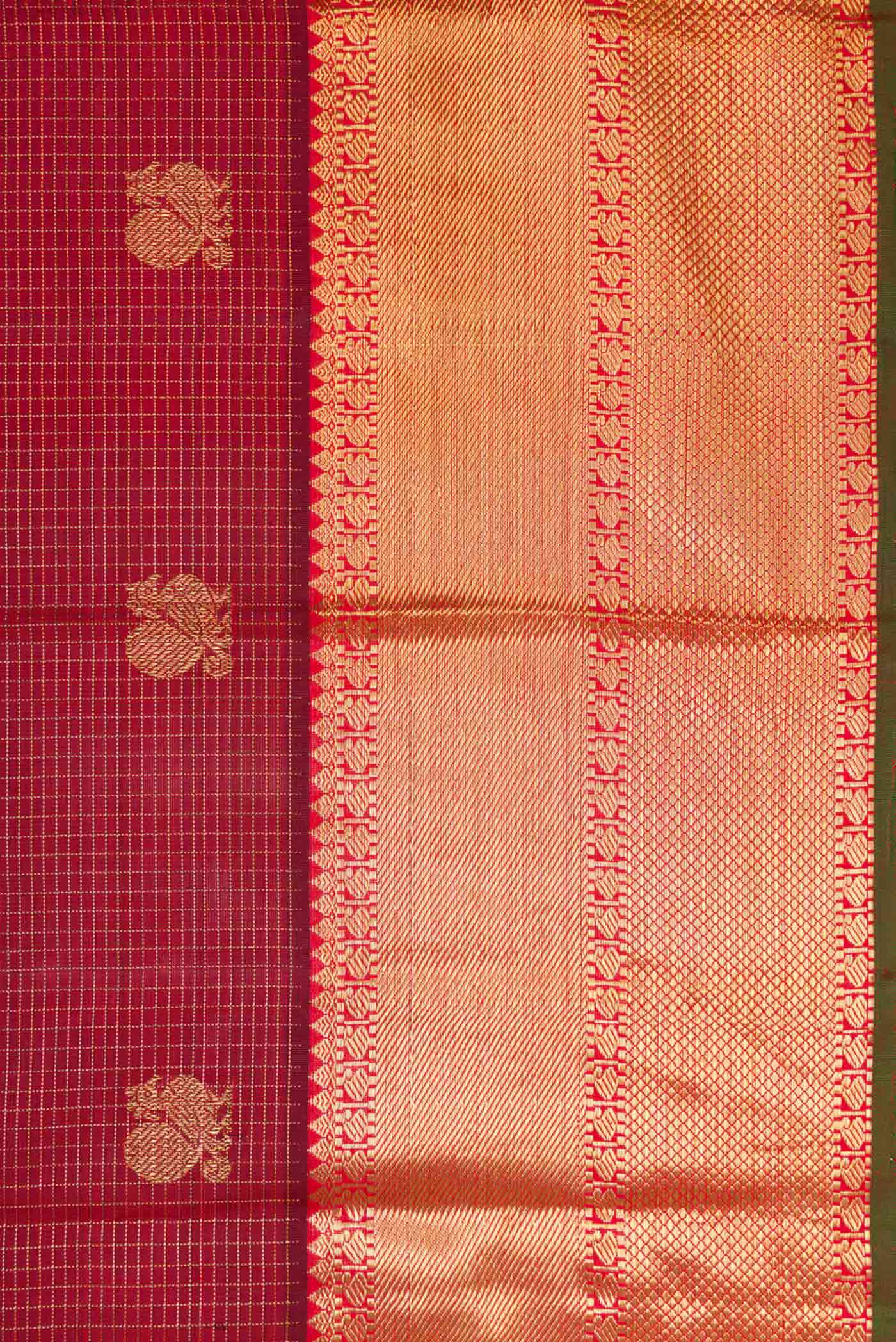 Border image of Maroon Dual Tone Kanjivaram Silk Saree with Zari Butta on the body and Zari Border. 
