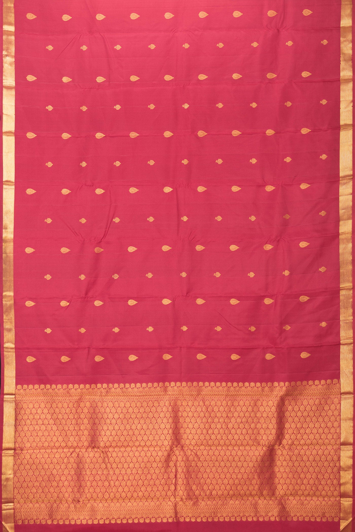 Flat view of Maroon Dual Tone Kanchipuram Silk Saree with Zari Butta on the body and Zari Border. 
