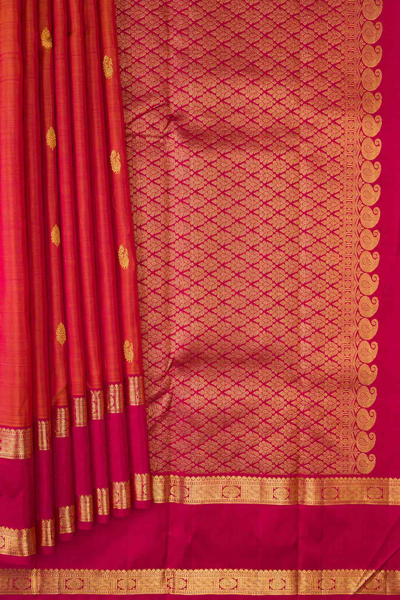 Pleats and pallu of Mustard Dual Tone Kanjivaram Silk Saree with Zari Butta on the body and Zari Border. 