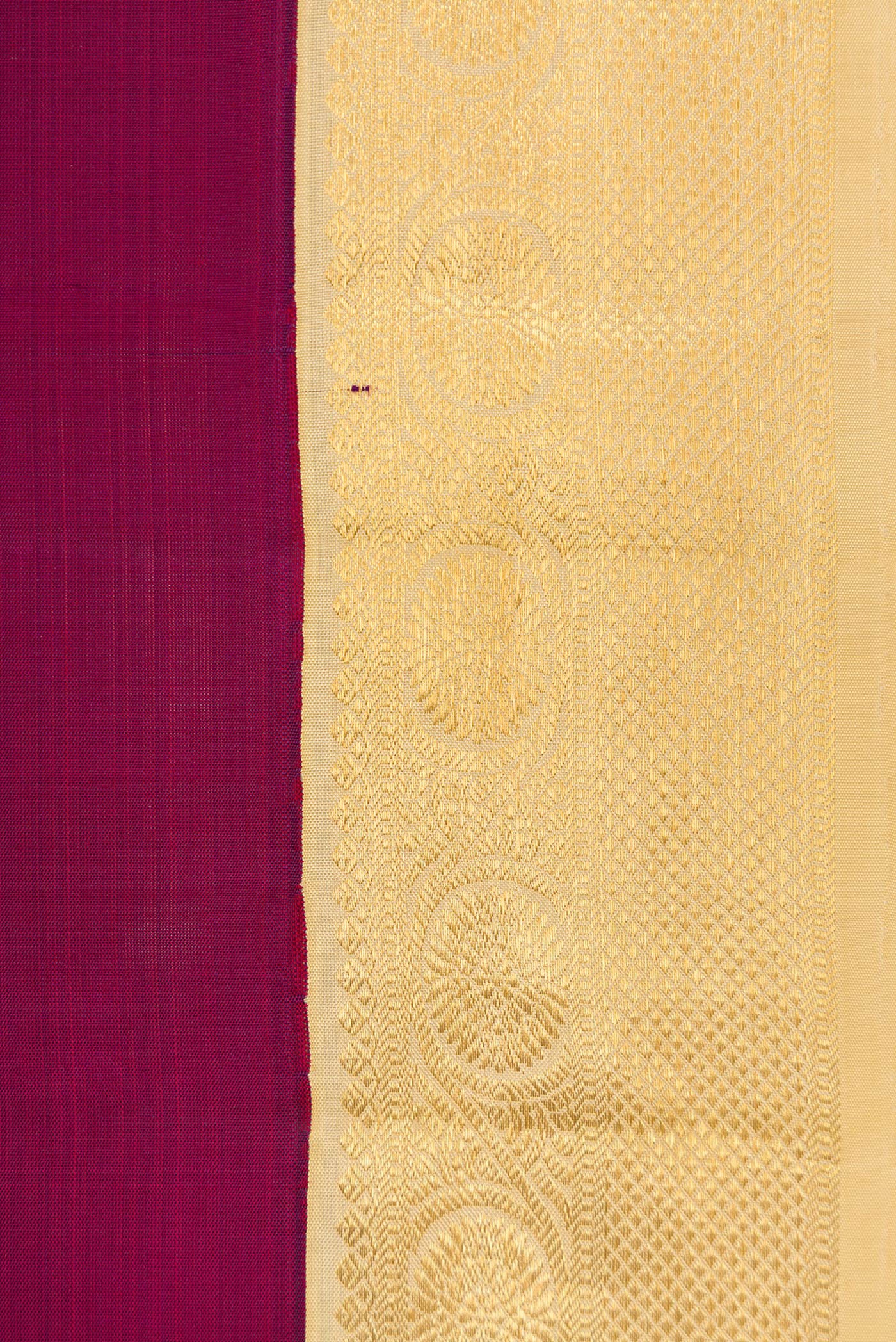 Border image of Burgundy Dual Tone Kanjivaram Silk Saree with Plain Body and Zari Border. 